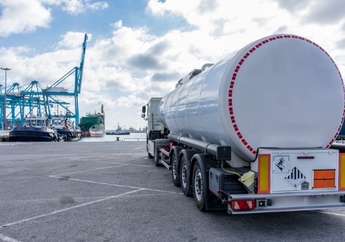A tanker truck delivering oil as part of fuel transportation