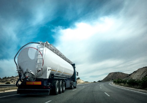 A gas tanker traveling on the highway as a part of Fuel Transportation